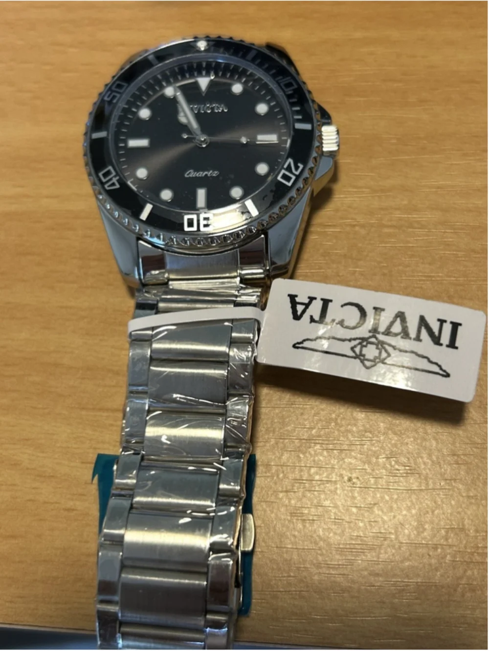 Invicta Men's Watch Model # 69401 Silver Band w/Black Face Analog, Quartz